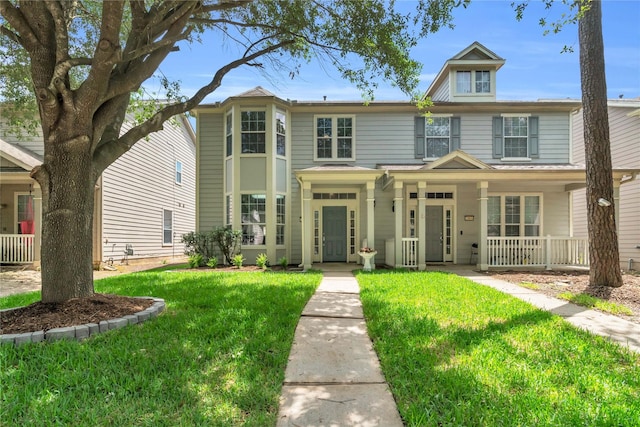 23838 Township Elm St, Spring, TX 77373 - view of front of house featuring a front yard and a porch