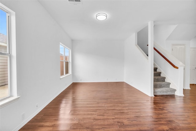 23838 Township Elm St, Spring, TX 77373 - unfurnished living room with stairs, wood finished floors, and baseboards