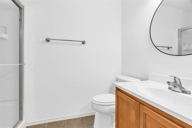 23838 Township Elm St, Spring, TX 77373 - bathroom with a shower with door, vanity, toilet, tile patterned floors, and baseboards