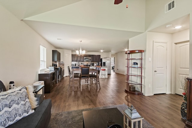 24402 Yellow Thyme Dr, Spring, TX 77373 - living room with a chandelier, dark wood-style flooring, and a ceiling fan