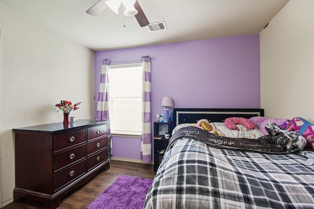 24402 Yellow Thyme Dr, Spring, TX 77373 - bedroom featuring dark wood-style flooring and a ceiling fan