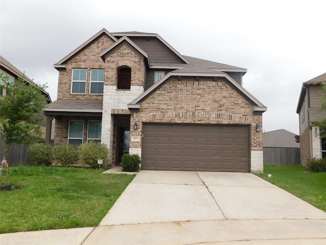 14827 Fairy Tern Ln, Houston, TX 77049 - craftsman house with brick siding, a front yard, an attached garage, and concrete driveway