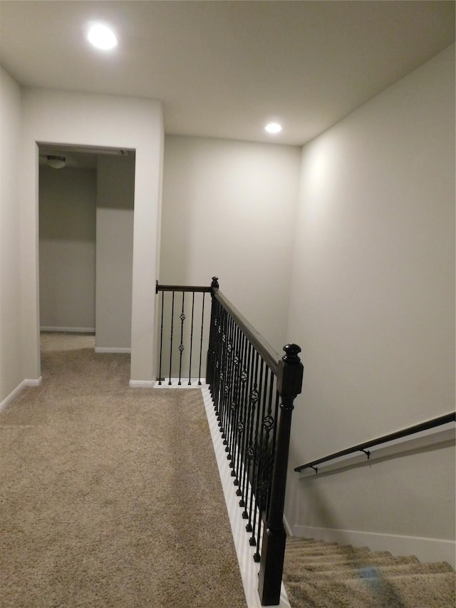 14827 Fairy Tern Ln, Houston, TX 77049 - stairs featuring carpet floors, baseboards, and recessed lighting
