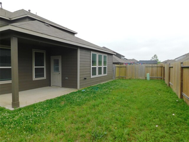 14827 Fairy Tern Ln, Houston, TX 77049 - view of yard featuring a patio area