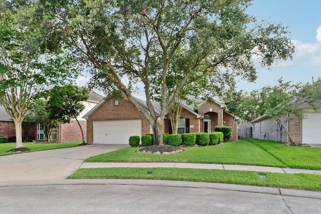 5023 Rocky Manor Ln, Katy, TX 77449 - view of front of property featuring brick siding, a garage, a front lawn, and driveway