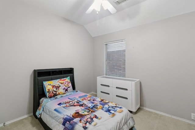 5023 Rocky Manor Ln, Katy, TX 77449 - bedroom with light carpet, vaulted ceiling, baseboards, and a ceiling fan
