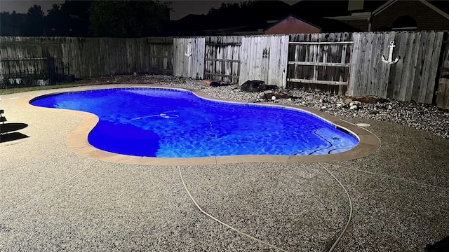 5023 Rocky Manor Ln, Katy, TX 77449 - view of swimming pool with a fenced backyard and a patio