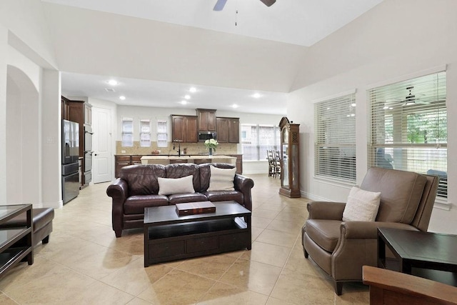266 Overland Trce, Montgomery, TX 77316 - living room featuring a ceiling fan, recessed lighting, lofted ceiling, light tile patterned floors, and baseboards