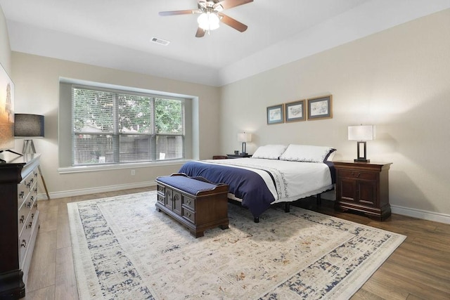 266 Overland Trce, Montgomery, TX 77316 - bedroom with baseboards, wood finished floors, and a ceiling fan