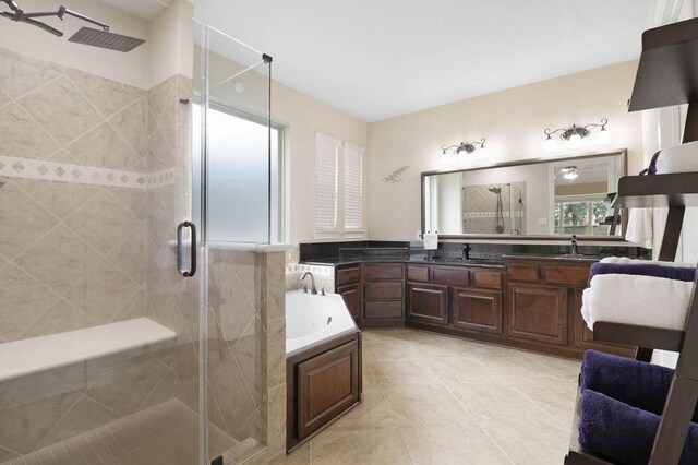 266 Overland Trce, Montgomery, TX 77316 - full bath with a stall shower, vanity, a bath, and tile patterned flooring