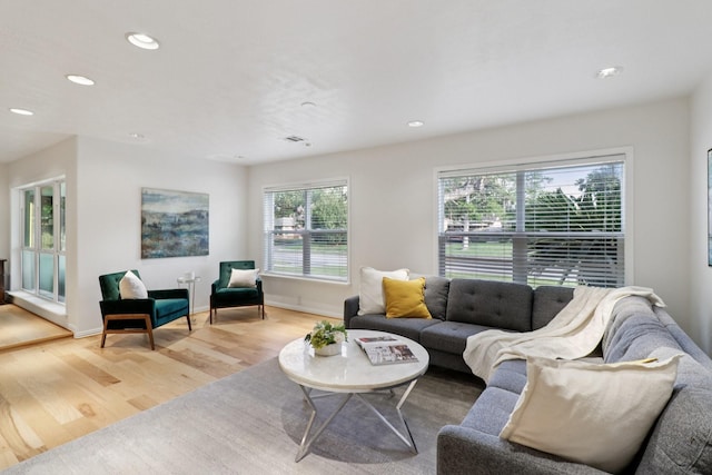 10328 Shadow Oaks Dr, Houston, TX 77043 - living area featuring light wood finished floors, recessed lighting, and baseboards