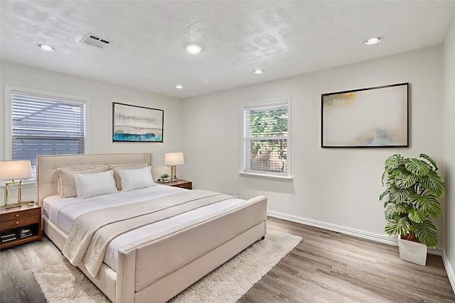 10328 Shadow Oaks Dr, Houston, TX 77043 - bedroom with recessed lighting, light wood-type flooring, and baseboards
