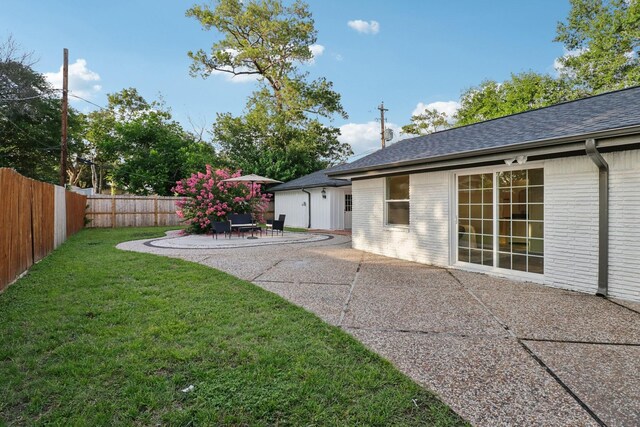 10328 Shadow Oaks Dr, Houston, TX 77043 - view of yard with a patio