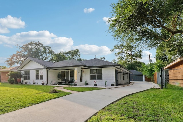 10328 Shadow Oaks Dr, Houston, TX 77043 - view of front of home featuring brick siding and a detached garage