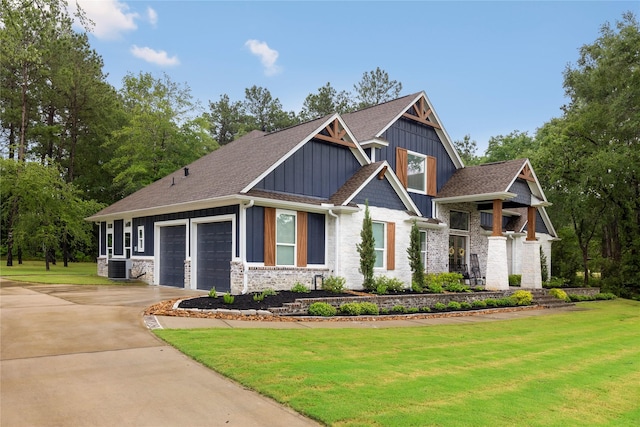 19817 Whispering Creek Trl, Magnolia, TX 77355 - craftsman inspired home with board and batten siding, stone siding, driveway, and a front yard