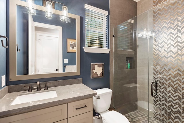 19817 Whispering Creek Trl, Magnolia, TX 77355 - full bath featuring toilet, vanity, and a shower stall