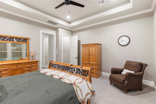 19817 Whispering Creek Trl, Magnolia, TX 77355 - bedroom with light carpet, crown molding, a tray ceiling, baseboards, and ceiling fan