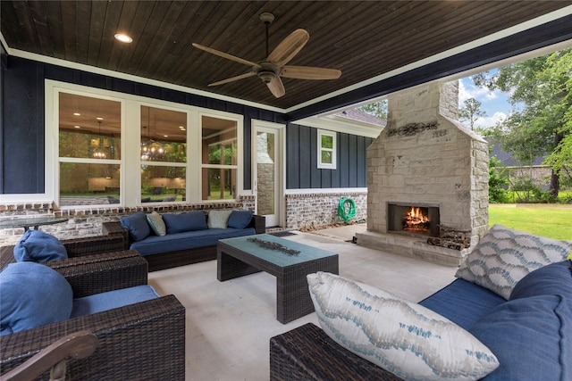 19817 Whispering Creek Trl, Magnolia, TX 77355 - view of patio with an outdoor living space with a fireplace and ceiling fan
