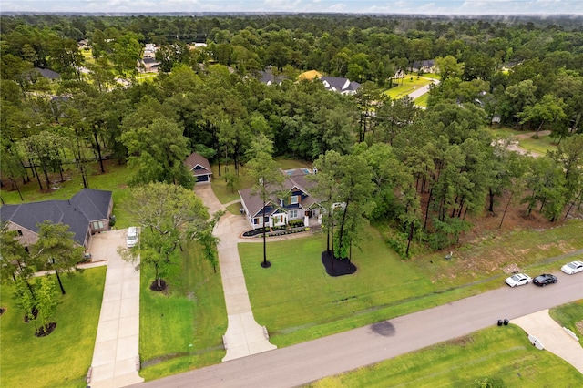 19817 Whispering Creek Trl, Magnolia, TX 77355 - drone / aerial view of a heavily wooded area
