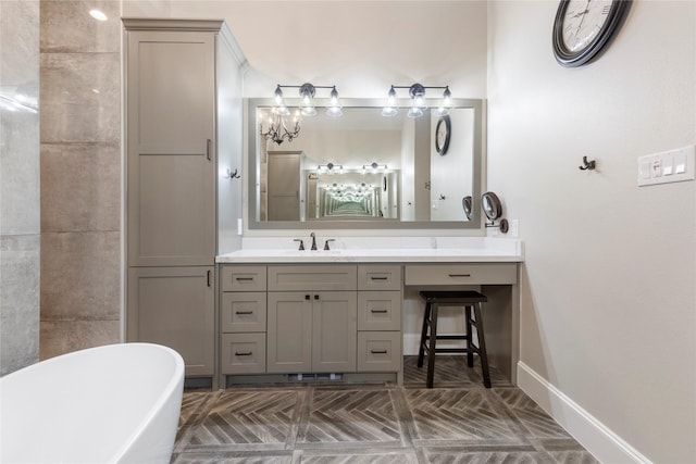 19817 Whispering Creek Trl, Magnolia, TX 77355 - bathroom with a soaking tub, baseboards, and vanity