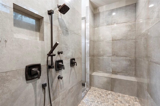 19817 Whispering Creek Trl, Magnolia, TX 77355 - bathroom featuring tiled shower
