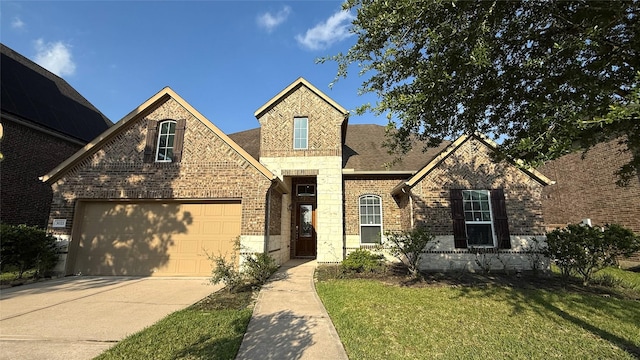 3021 Rocky Point Dr, Pearland, TX 77584 - french country home featuring brick siding, concrete driveway, a front yard, a shingled roof, and a garage