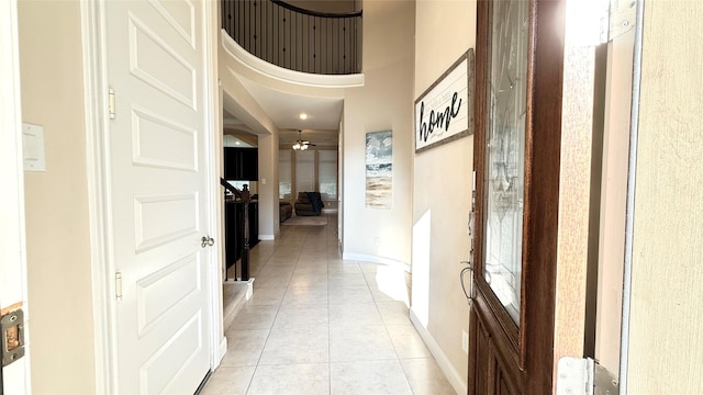 3021 Rocky Point Dr, Pearland, TX 77584 - hallway with light tile patterned flooring and baseboards