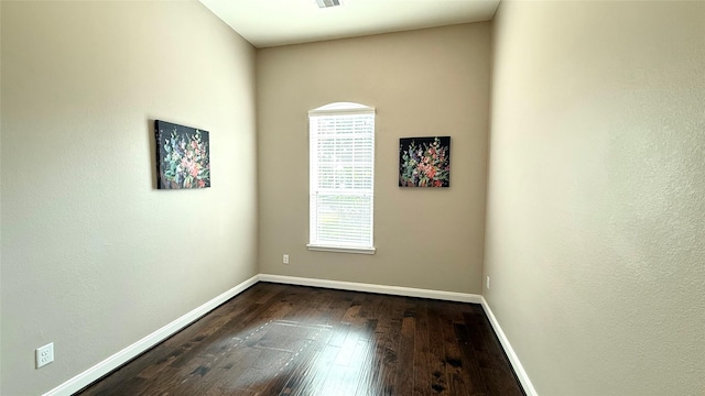 3021 Rocky Point Dr, Pearland, TX 77584 - empty room featuring dark wood-style floors and baseboards