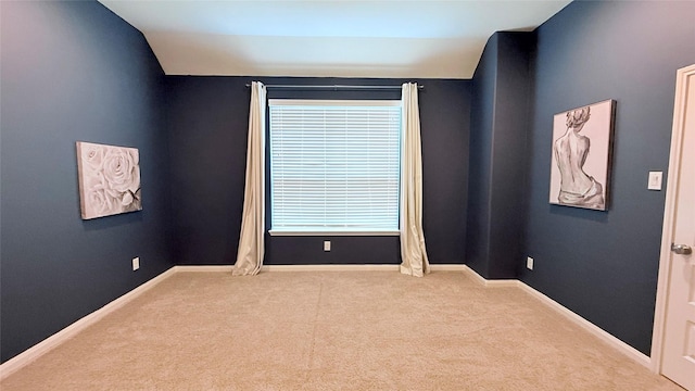 3021 Rocky Point Dr, Pearland, TX 77584 - carpeted empty room featuring baseboards and lofted ceiling