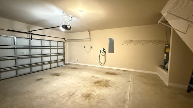 3021 Rocky Point Dr, Pearland, TX 77584 - garage featuring baseboards, electric panel, a garage door opener, and water heater