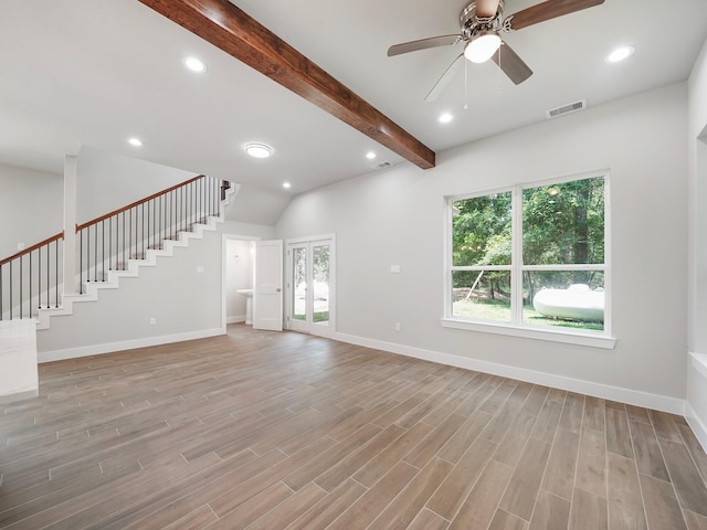 731 Magnolia Point Dr, Houston, TX 77336 - unfurnished living room featuring light wood-style flooring, ceiling fan, baseboards, stairs, and recessed lighting