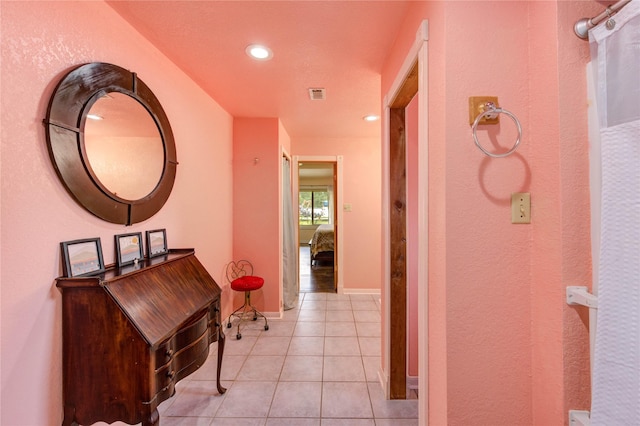 2465 Ryan Dr, Alvin, TX 77511 - hall with recessed lighting and light tile patterned flooring