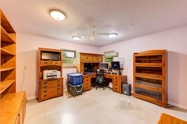 2465 Ryan Dr, Alvin, TX 77511 - office area featuring ceiling fan, a textured ceiling, and baseboards
