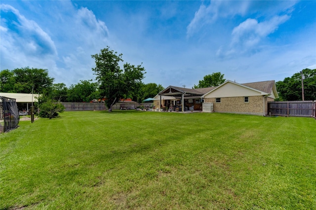 2465 Ryan Dr, Alvin, TX 77511 - view of yard with a patio