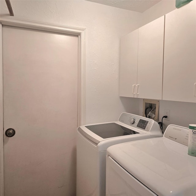 3306 S Greenpark Dr, Houston, TX 77082 - washroom featuring cabinet space and independent washer and dryer