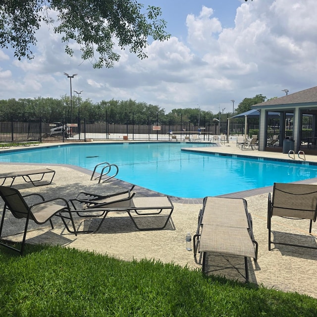 3306 S Greenpark Dr, Houston, TX 77082 - community pool featuring a patio area