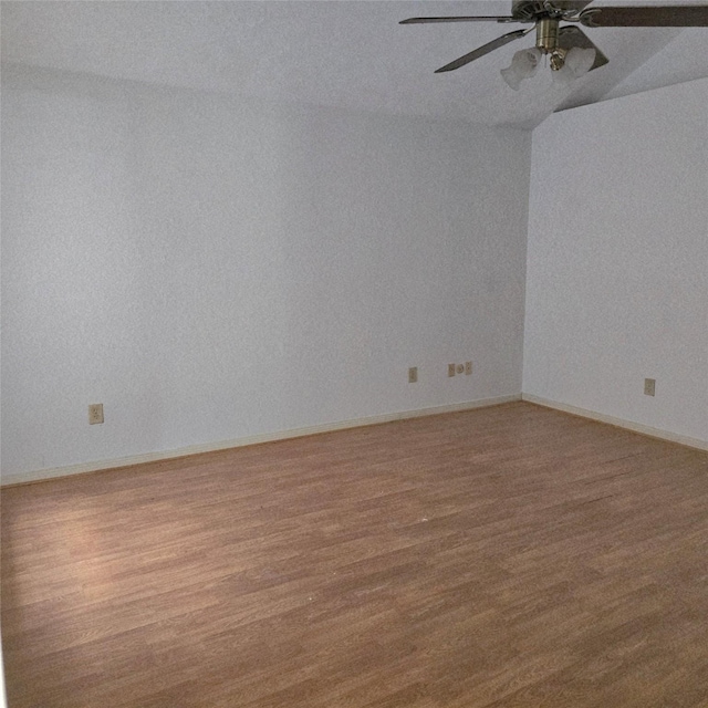 3306 S Greenpark Dr, Houston, TX 77082 - empty room with a ceiling fan, wood finished floors, and lofted ceiling
