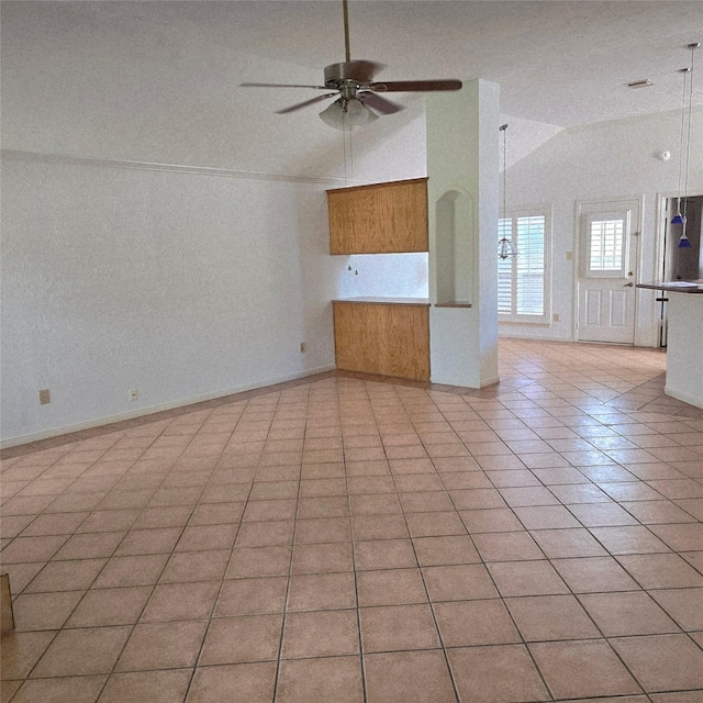 3306 S Greenpark Dr, Houston, TX 77082 - unfurnished living room with lofted ceiling, ceiling fan, and light tile patterned floors