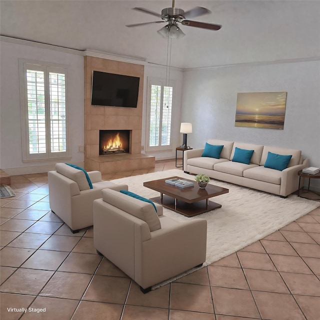 3306 S Greenpark Dr, Houston, TX 77082 - living area featuring light tile patterned flooring, a ceiling fan, a tiled fireplace, and crown molding