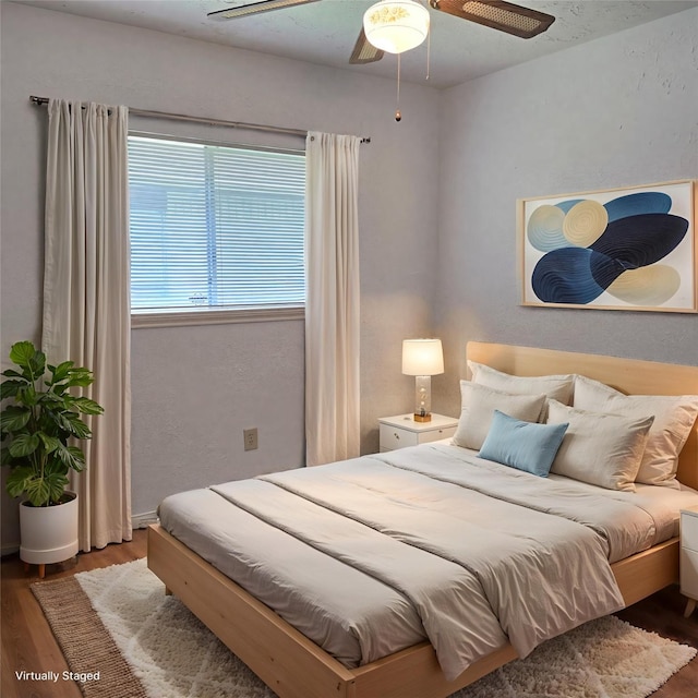 3306 S Greenpark Dr, Houston, TX 77082 - bedroom with wood finished floors and a ceiling fan