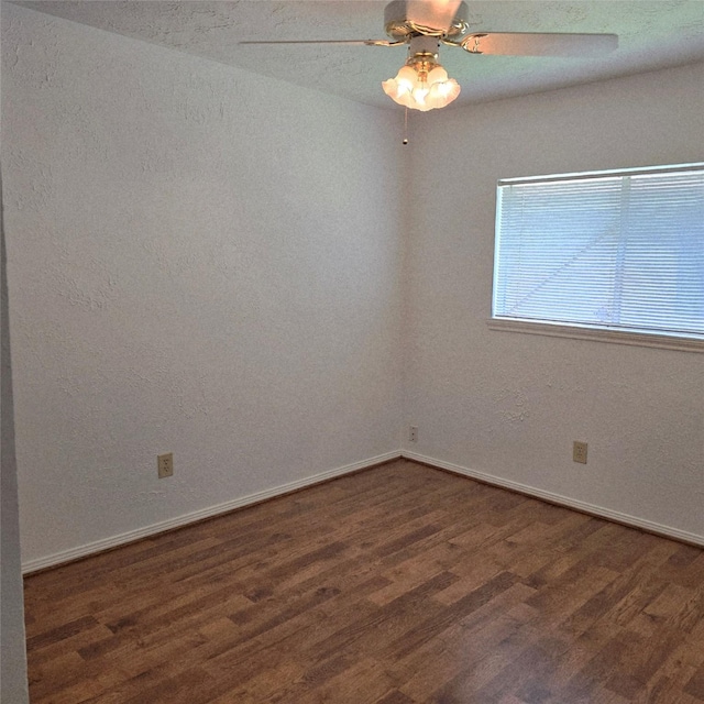 3306 S Greenpark Dr, Houston, TX 77082 - spare room featuring wood finished floors and ceiling fan