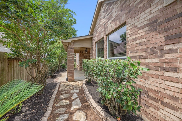 26019 Pagemill Ln, Richmond, TX 77406 - doorway to property with brick siding and a patio