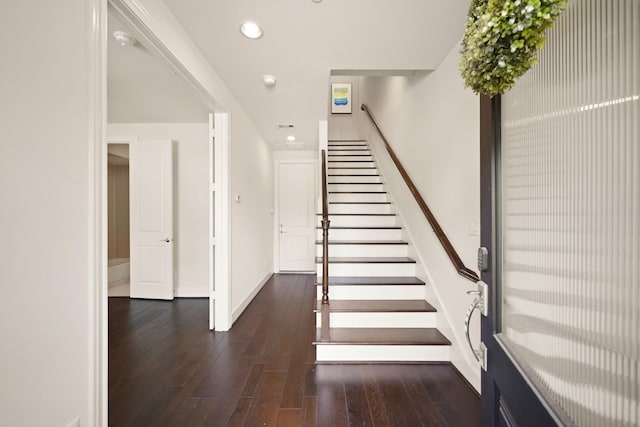 1317 Roy St, Houston, TX 77007 - staircase with wood-type flooring, recessed lighting, and baseboards