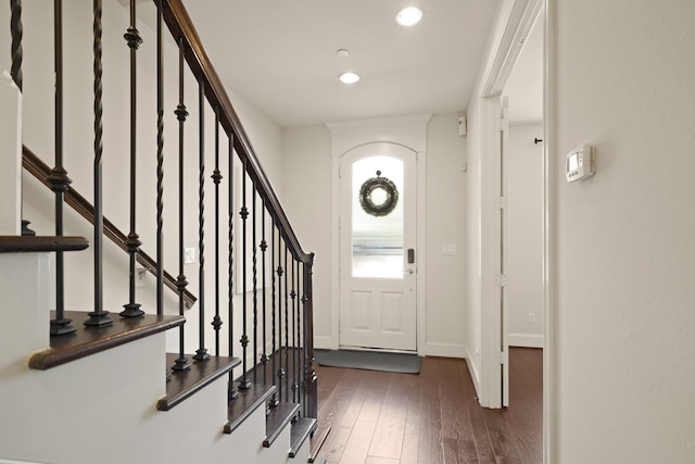 1317 Roy St, Houston, TX 77007 - entryway with hardwood / wood-style floors, baseboards, recessed lighting, stairway, and arched walkways