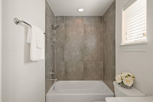 1317 Roy St, Houston, TX 77007 - bathroom featuring toilet and washtub / shower combination