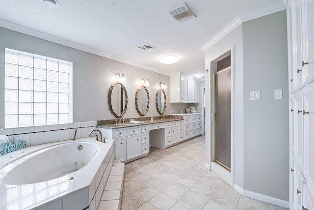 1313 Mcdonald St, Deer Park, TX 77536 - full bathroom with double vanity, a jetted tub, a shower stall, ornamental molding, and tile patterned flooring