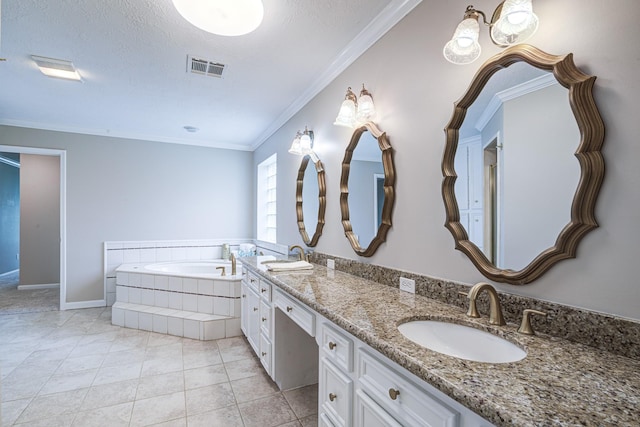 1313 Mcdonald St, Deer Park, TX 77536 - bathroom featuring double vanity, a garden tub, ornamental molding, tile patterned floors, and a textured ceiling