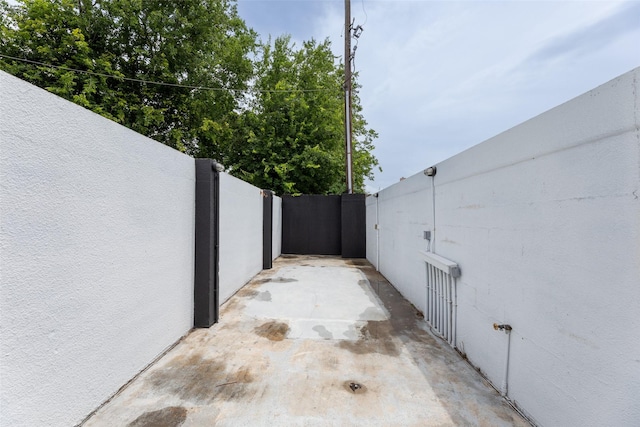 12203 Ashley Circle Dr E, Houston, TX 77071 - view of patio / terrace with a gate