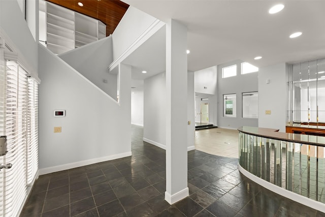 12203 Ashley Circle Dr E, Houston, TX 77071 - foyer with recessed lighting, baseboards, stone tile flooring, and a towering ceiling