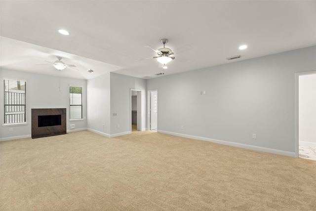 12203 Ashley Circle Dr E, Houston, TX 77071 - unfurnished living room featuring a ceiling fan, light colored carpet, baseboards, recessed lighting, and a high end fireplace